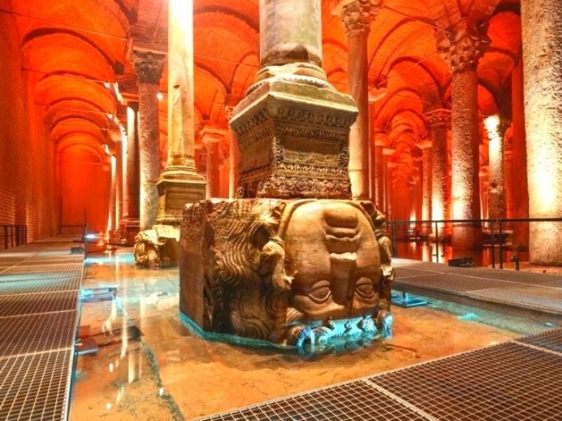 The Medusa head sculpture in the Basilica Cistern, featuring an upside-down placement of a mythical creature's head.