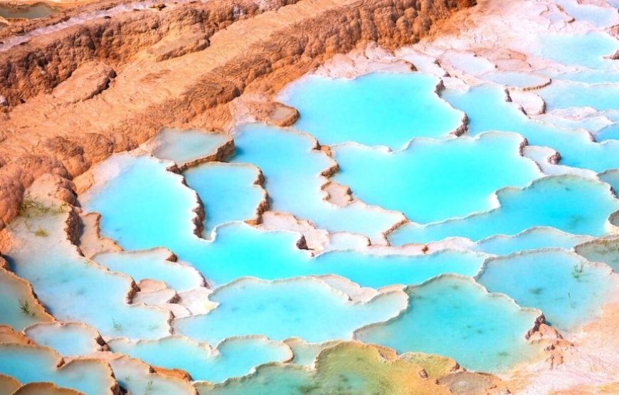 Stunning natural terraces of Pamukkale Travertines in Turkey, with mineral-rich thermal waters.