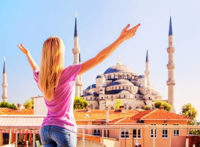 The Blue Mosque in Istanbul with its stunning domes and minarets under a clear sky.