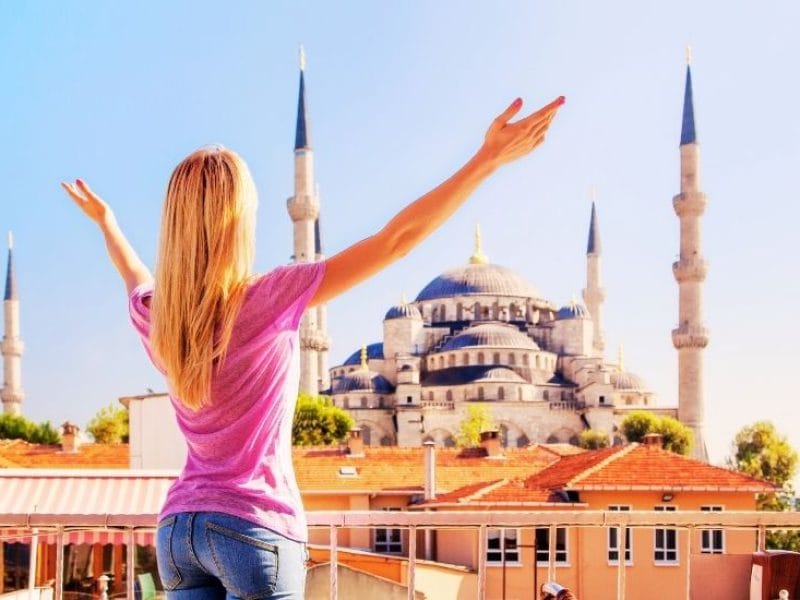 The Blue Mosque in Istanbul with its stunning domes and minarets under a clear sky.