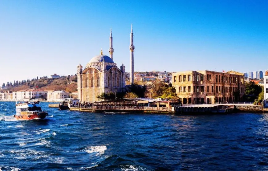 Scenic view from a Bosphorus cruise in Istanbul, with landmarks on both sides.