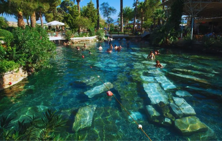 Cleopatra’s Pool in Pamukkale, Turkey, featuring warm thermal waters and submerged ancient marble columns.
