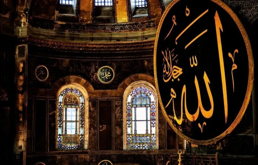 Magnificent Arabic calligraphy of 'Allah' adorning the walls of Hagia Sophia in Istanbul, symbolizing Ottoman heritage.