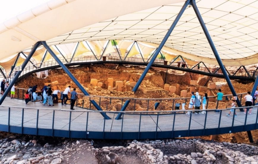 Excavated ruins of Göbeklitepe, revealing circular stone structures and archaeological remains.