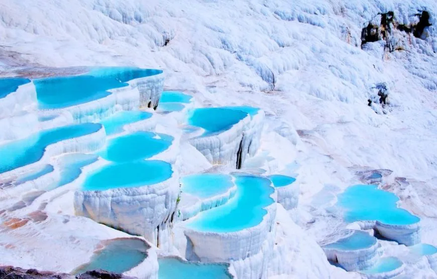 Close-up view of Pamukkale’s travertine terraces and turquoise thermal waters.