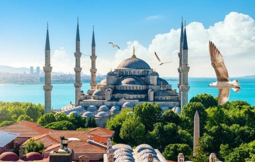 The stunning Blue Mosque in Istanbul, Turkey, showcasing its grand domes and six minarets.