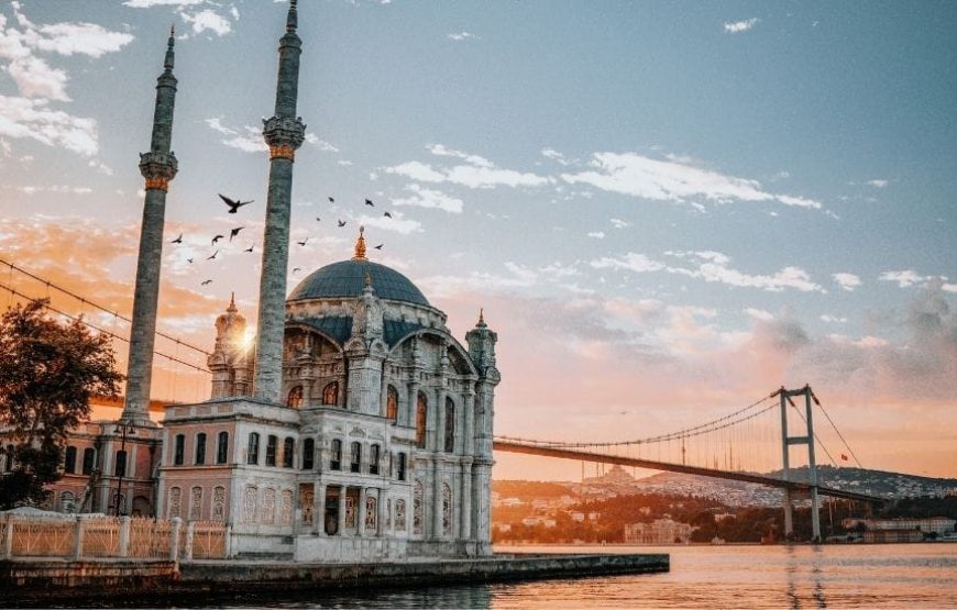 Scenic view of Ortaköy Mosque in Istanbul, Turkey, with the Bosphorus Bridge in the background.